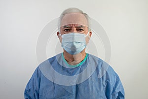 Old senior male man surgeon uniform doctor help people face mask