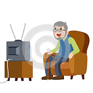 Old Senior man sitting in armchair and watching retro TV.