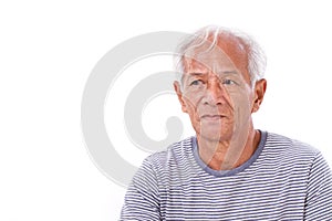 Old senior man suffering from eye disease, surfer's eye looking up photo