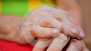 Old senior woman hands with wrinkled skin