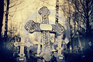 Old sepulchral cross at the cemetery