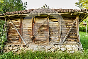 Old Serbian rural traditional wooden corn bar