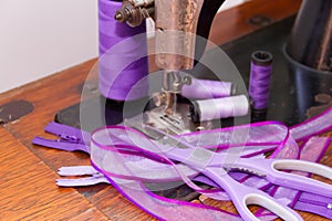 Old sewing machine and sewing elements photo