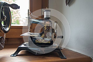 Old sewing machine on the window