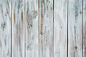 Old shabby boardwalk gray background for copy space. Part of a wooden fence