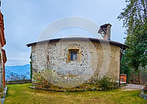 The old shabby medieval San Maurizio Church in Lugano, Switzerland photo