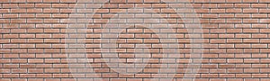 Old shabby red brick wall wide texture. Rough brickwork grunge panoramic background