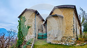 The old shabby medieval San Maurizio Church in Lugano, Switzerland photo