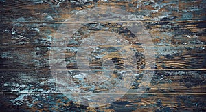 Old shabby wooden boards, background with traces of blue paint, texture of old wood, vintage, rustic, traces of paint, dark blue,