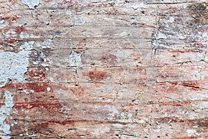 Old shabby wooden planks background with cracked color paint