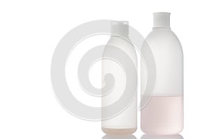 Old shampoo bottle isolated on white background.