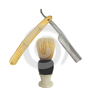 Old shaving brush and straight razor