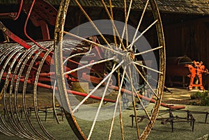 Old shed with aged vintage agriculture tools, rustic style.