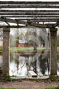 Old shed near the lake a cloudy autumn day