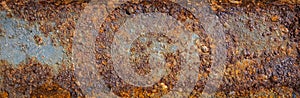 Old sheet steel with peeling paint and brown rust