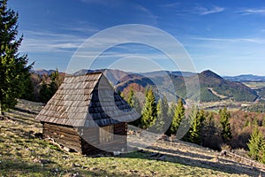 Old shelter on the slovak mountains, summer day with blue sky