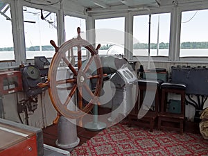 Ship wheel, ruder, interior photo