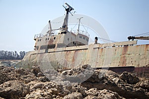 old ship ran aground. The ship washed ashore. Wrecked ship