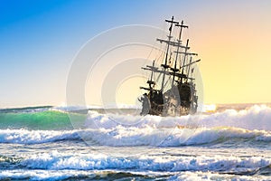 Old ship silhouette in sunset scenery