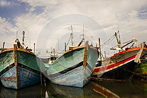 old ships in the port of Tegal city photo