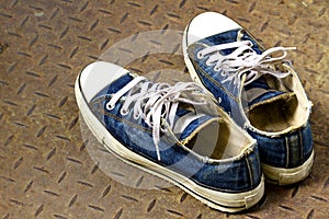 Old shoe on the Iron ground