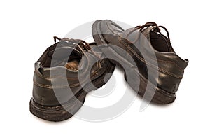 Old shoes - Still life pair of brown leather shoes old and dirty