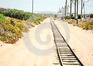 Old shore rail road in sands