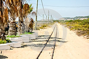 Old shore rail road in sands