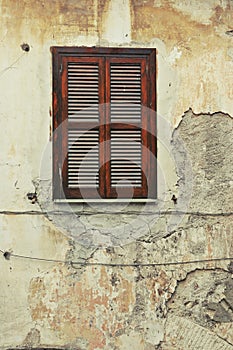 Old shuttered window