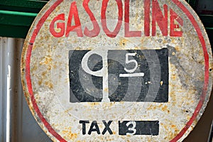 Old sign with gas prices.