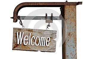 The Old Signboard welcome hanging on old rusty grunge scale. Vintage retro rusty wooden sign isolated on a white background