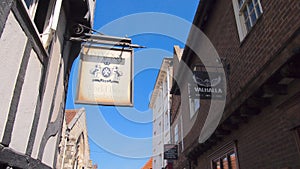 Old signs in the medieval centre of York, Great Britain