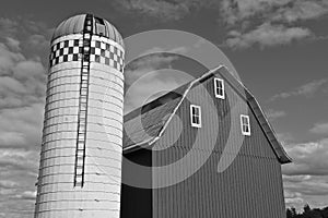 Old barn and silo in black and white photo