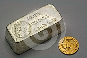 Old Silver Bullion Bar and Gold Coin