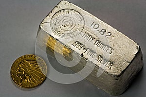 Old Silver Bullion Bar and Gold Coin