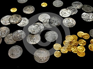 old silver and gold coins