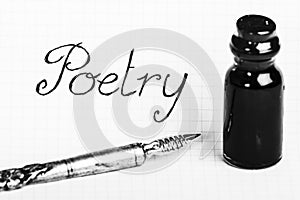 Old pen and ink bottle for poetry photo