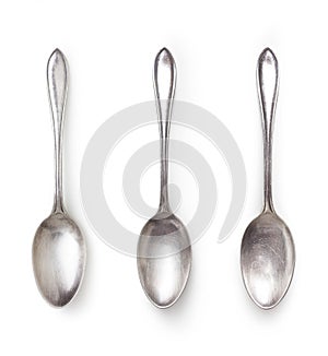 Old silver spoon isolated on white with clipping path included