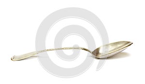 Old silver spoon made in 1924 on white background