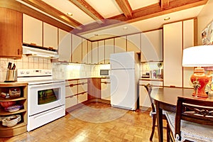 Old simple white and wood kitchen interior.