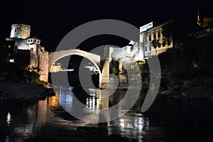 The old sixteenth century ottoman bridge in Mostar in the night photo