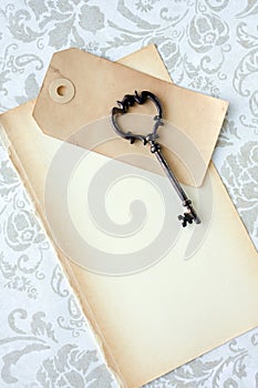 Old skeleton key and paper