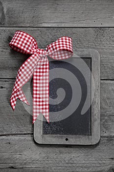 Old slate - empty black chalkboard for a greeting card or a wooden board for advertising photo