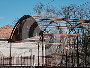 Old slaughterhouse structure with rusty iron decorations EX MACELLO MONZA italy, lombardy