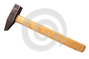 Old sledge hammer with wooden handle on a white