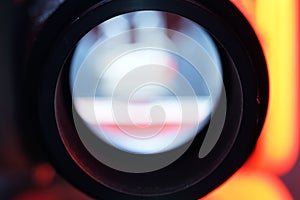 Old slide projector with slide frame photographed in the studio with flash light