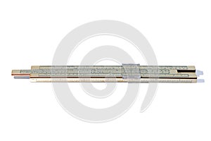 Old slide rule isolated on white background. Vintage logarithmic ruler