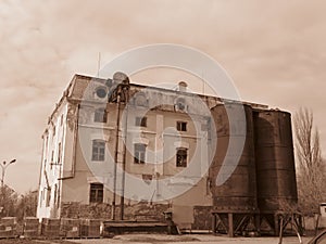 An old small factory plant manufactory works building in Sepia colour.