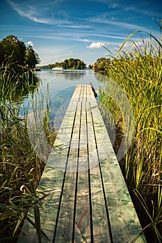 Old small pier at the lake Galve in Trakai