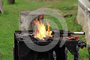 Old smithery and fire